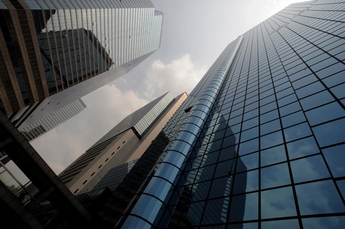 Buildings are reflected on each other in