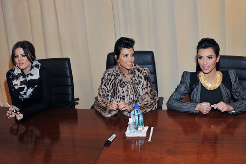 Kim, Khloe & Kourtney Kardashian Sign Copies Of “Kardashian Konfidential”