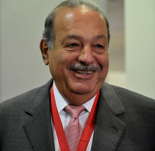 Mexican tycoon Carlos Slim smiles after